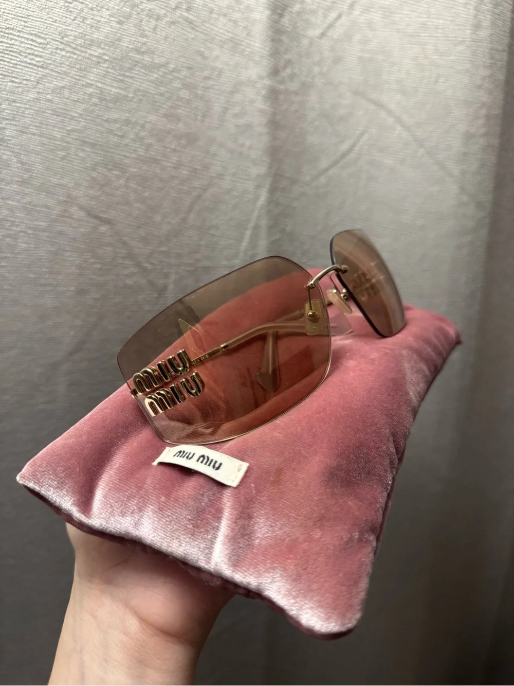 Miu Miu Gold Frame Pink Gradient Rimless Sunglasses